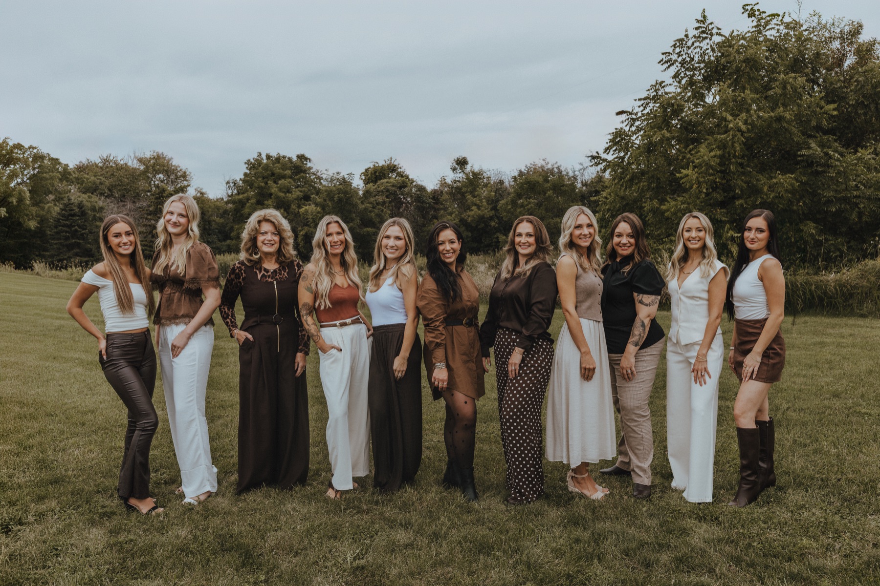 All eleven Glossed Girls together outdoors